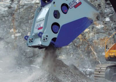 A large machine is digging into the ground